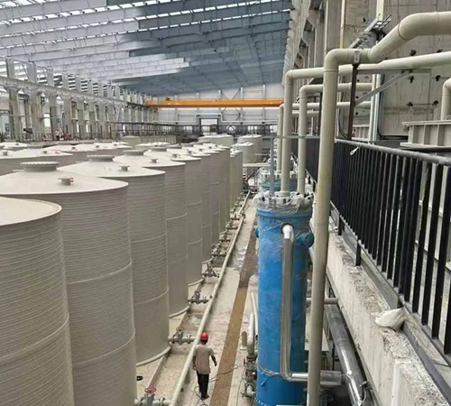 Circulation of liquid absorbent in waste gas treatment system